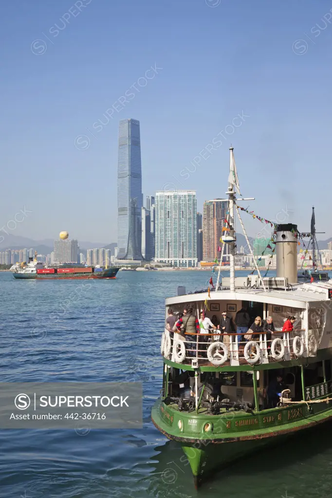 Star ferry with buildings in the background, Hong Kong, China