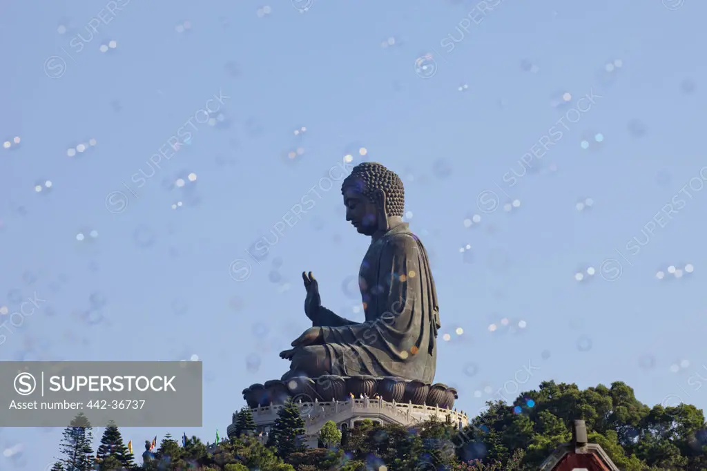 Low angle view of Tian Tan Buddha, Po Lin Monastery, Ngong Ping, Lantau, Hong Kong, China