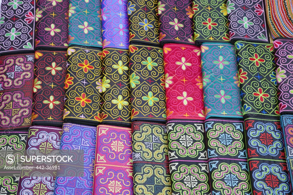 Display of silk purses at ethnic craft night market, Luang Phabang, Laos