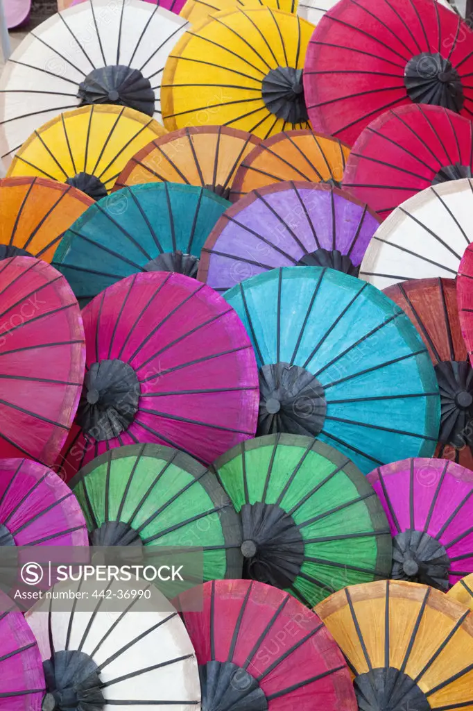 Display of sa paper umbrellas at ethnic craft night market, Luang Phabang, Laos