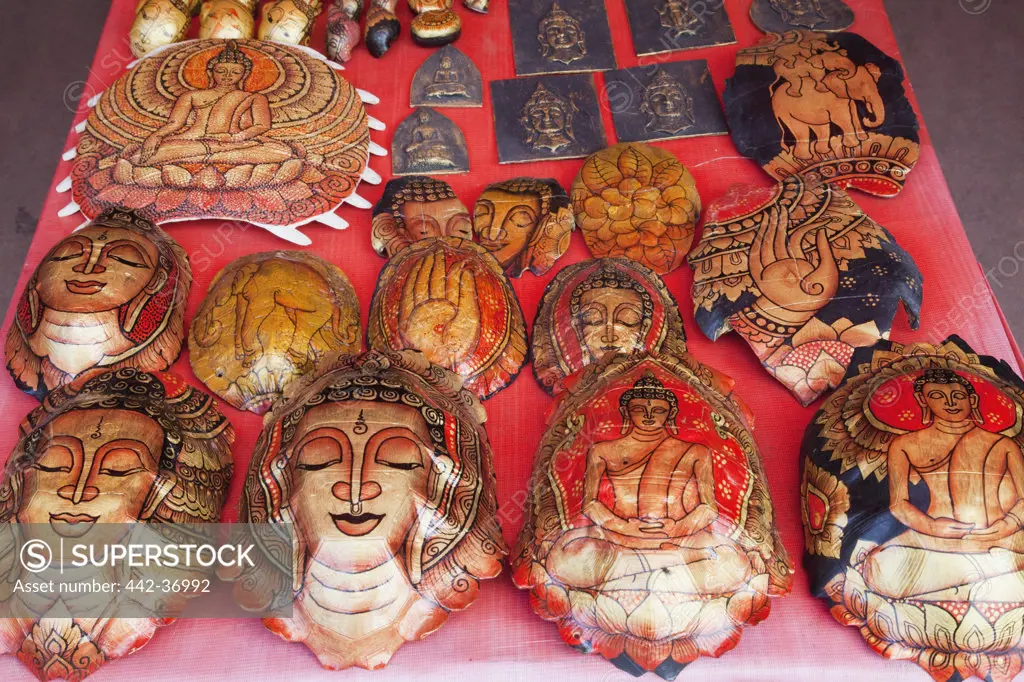 Display of souvenir painted tortoise shells at ethnic craft night market, Luang Phabang, Laos