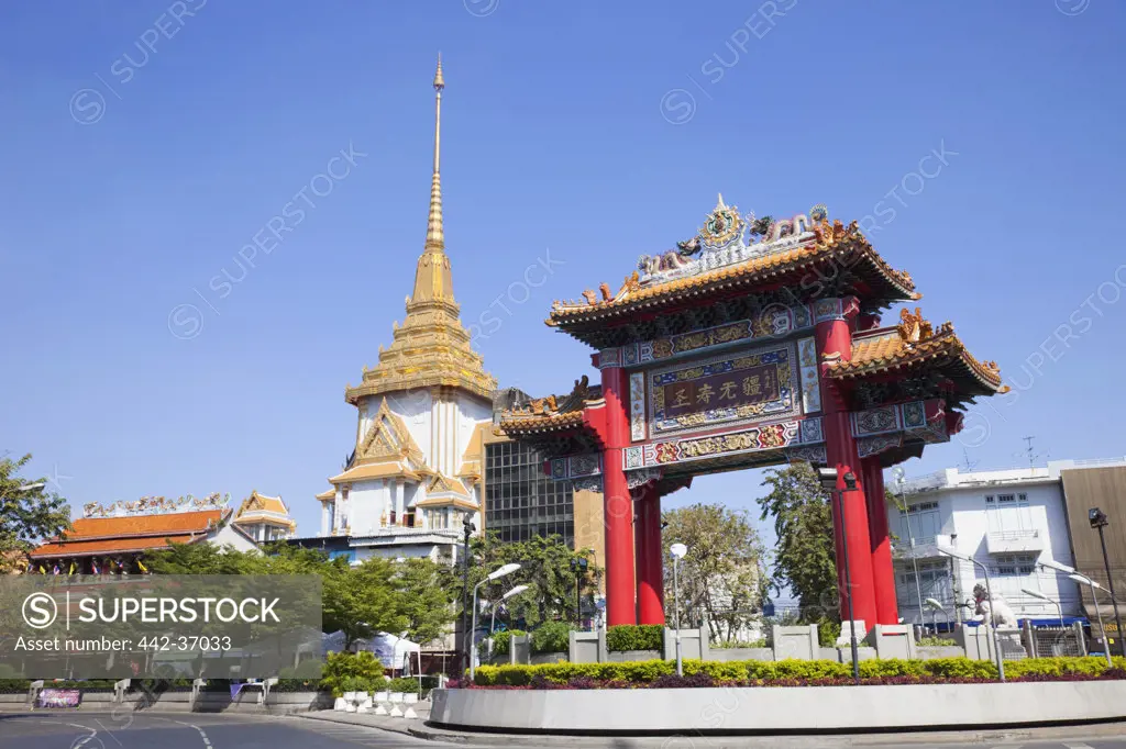 Chinatown gate and Wat Traimit, Bangkok, Thailand