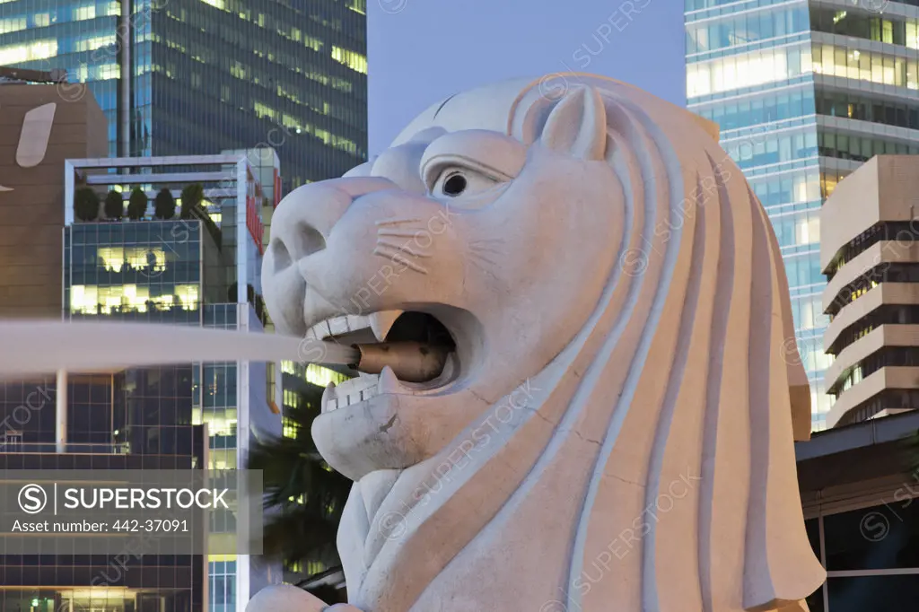 Merlion Statue with skyscrapers in the background, Singapore City, Singapore