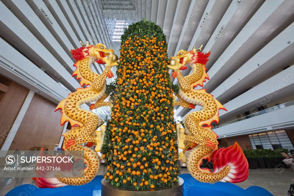 Chinese dragons and Mandarin tree at a hotel, Sands Hotel And Casino, Singapore City, Singapore