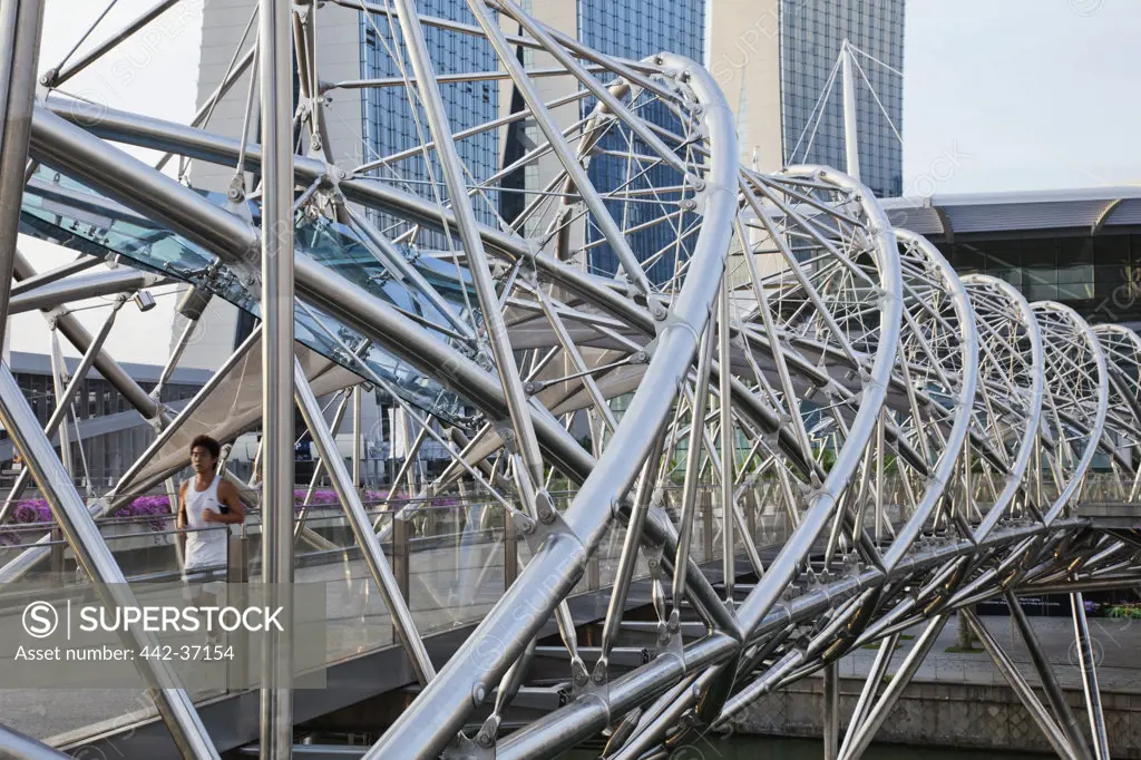 Man jogging on a footbridge, Helix Bridge, Singapore City, Singapore