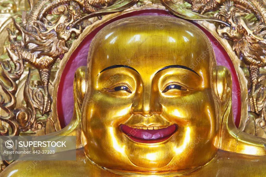 Laughing Buddha statue in a monastery, Western Monastery, Tsuen Wan, Hong Kong, China