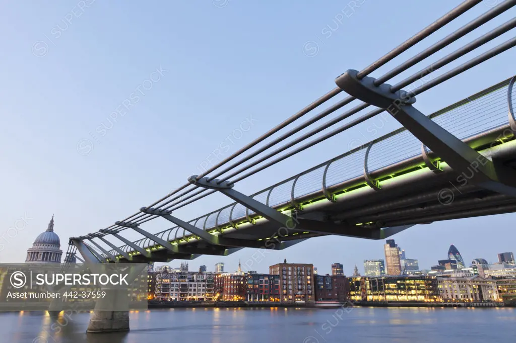 UK, London, Millenium Bridge, River Thames and City Area Skyline