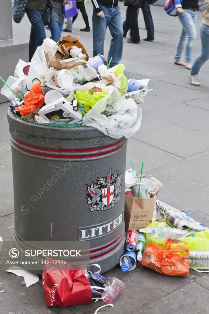 UK, London, City of London, Overflowing Public Litter Bin near St. Paul's Cathedral
