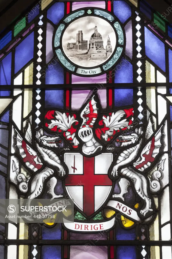 England,London,The City,Guildhall,Stained Glass Window depicting City of London Coat of Arms with the Motto ""Domine Nos Dirige"" (Lord Guide Us)