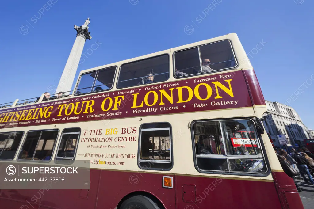 England,London,Trafalgar Square,Tour Bus and Nelson's Column