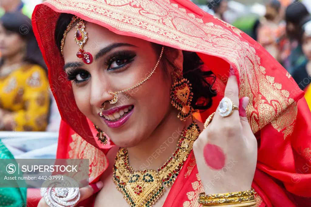 England, London, Banglatown, Bengali New Year Festival, Boishakhi Mela Parade, Girl in Bridal Costume