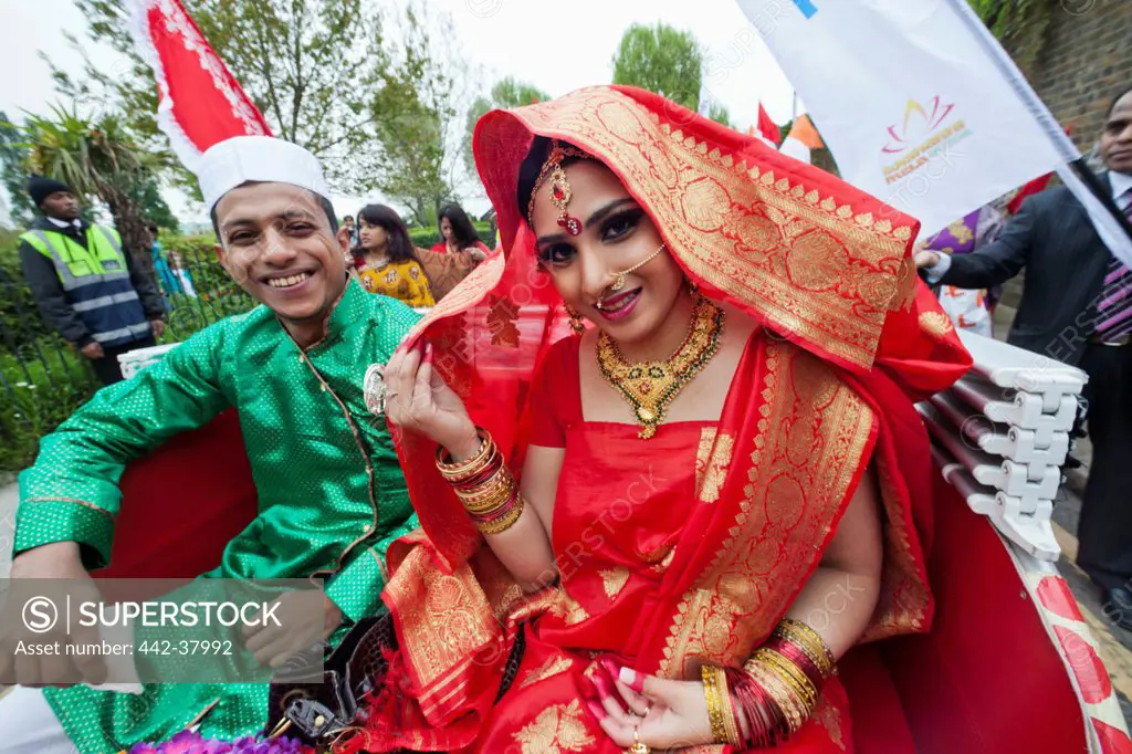 England, London, Banglatown, Bengali New Year Festival, Boishakhi Mela Parade, Couple in Traditional Wedding Costume