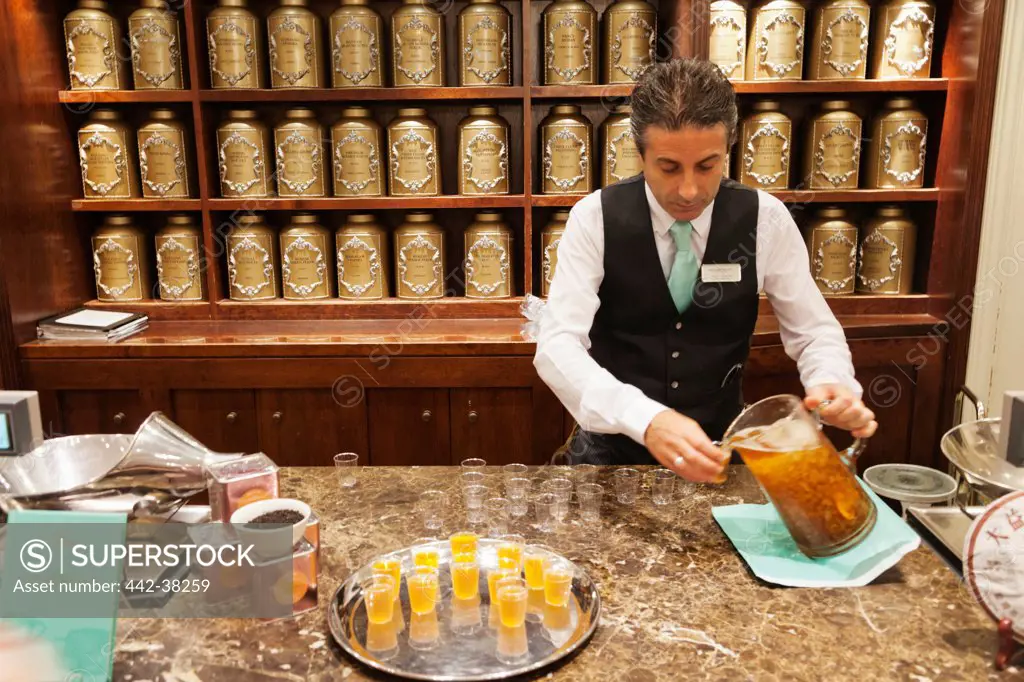 UK, London, Piccadilly, Bartender at tea store