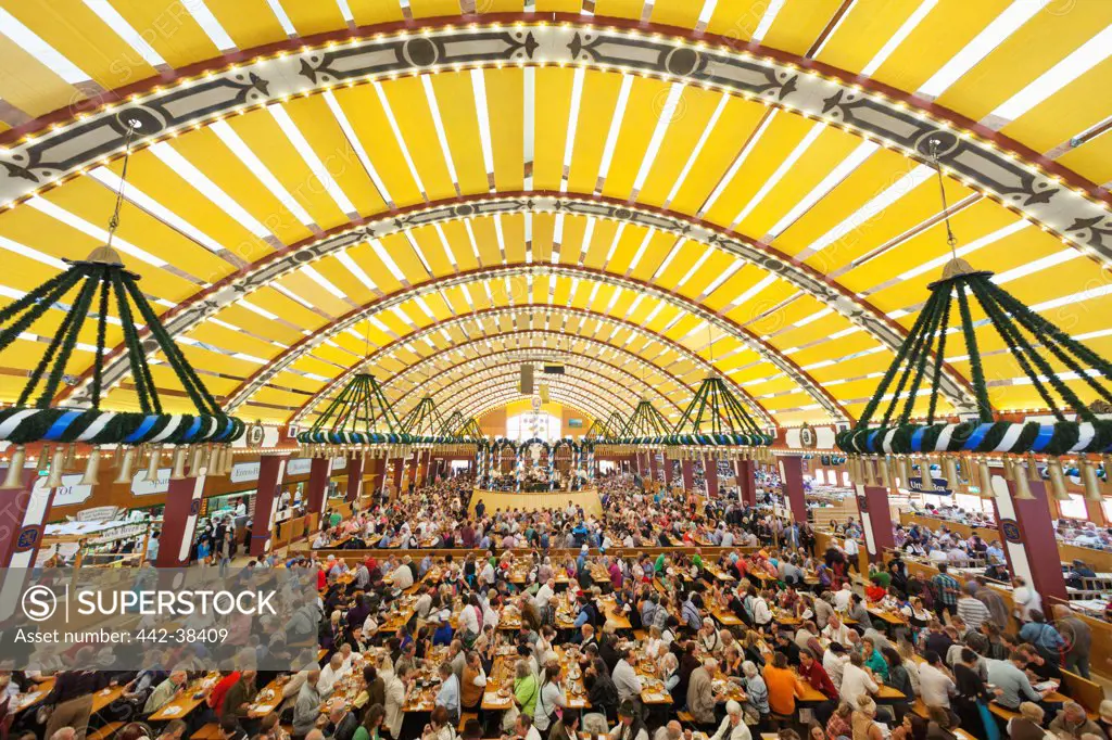 People drinking beer during Oktoberfest, Munich, Bavaria, Germany