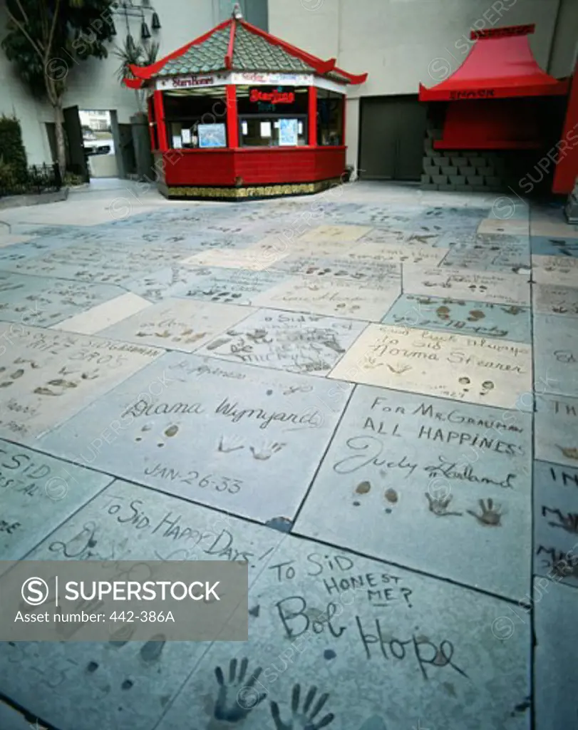 Shoe prints and handprints in concrete, Mann's Chinese Theater, Hollywood, Los Angeles, California, USA