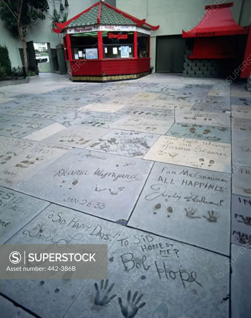 Shoeprints and hand prints in concrete, Mann's Chinese Theater, Hollywood, Los Angeles, California, USA