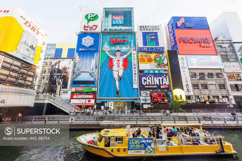 Japan, Honshu, Kansai, Osaka, Namba, Dotombori, Tour Boat On The Dotomborigawa River And Advertising Billboards