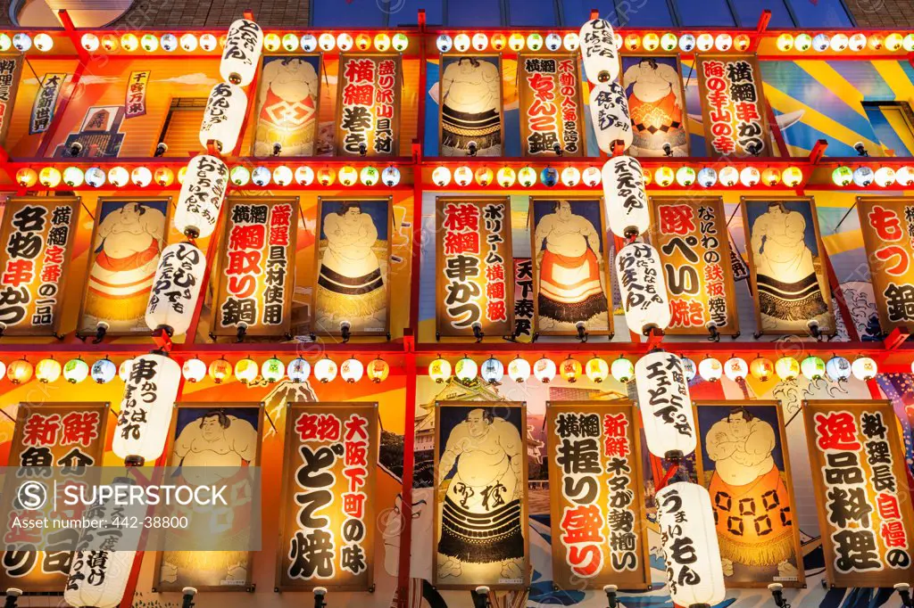 Japan, Honshu, Kansai, Osaka, Tennoji, Restaurant Facade with Lanterns and Sumo Wrestler Picture Decoration