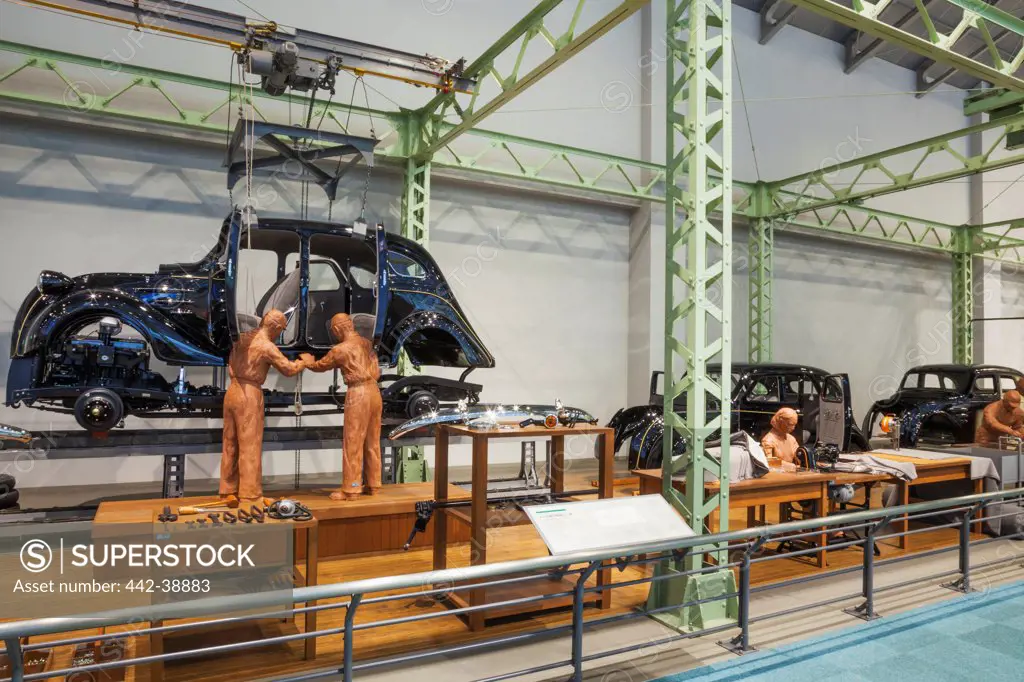 Japan, Honshu, Aichi, Nagoya, Toyota Commemorative Museum of Industry and Technology, Automobile Pavilion, Exhibit depicting The Production Line of Toyota Model A1 Car