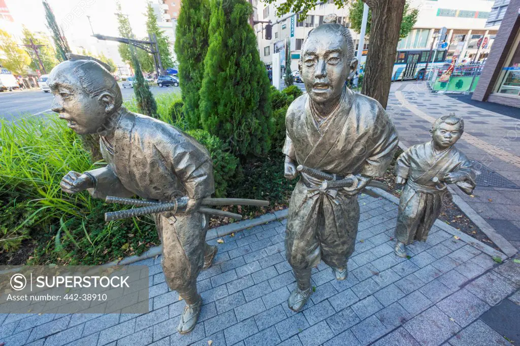 Japan, Kyushu, Kagoshima, Kagoshima City, Statues depicting Citizens Running to the Anglo-Satsuma Battle of 1863
