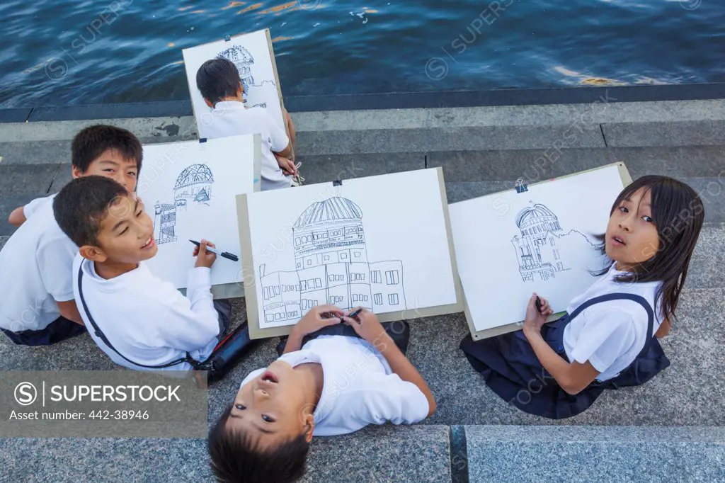 Japan, Kyushu, Hiroshima, Peace Memorial Park, School Children Drawing the A-Bomb Dome