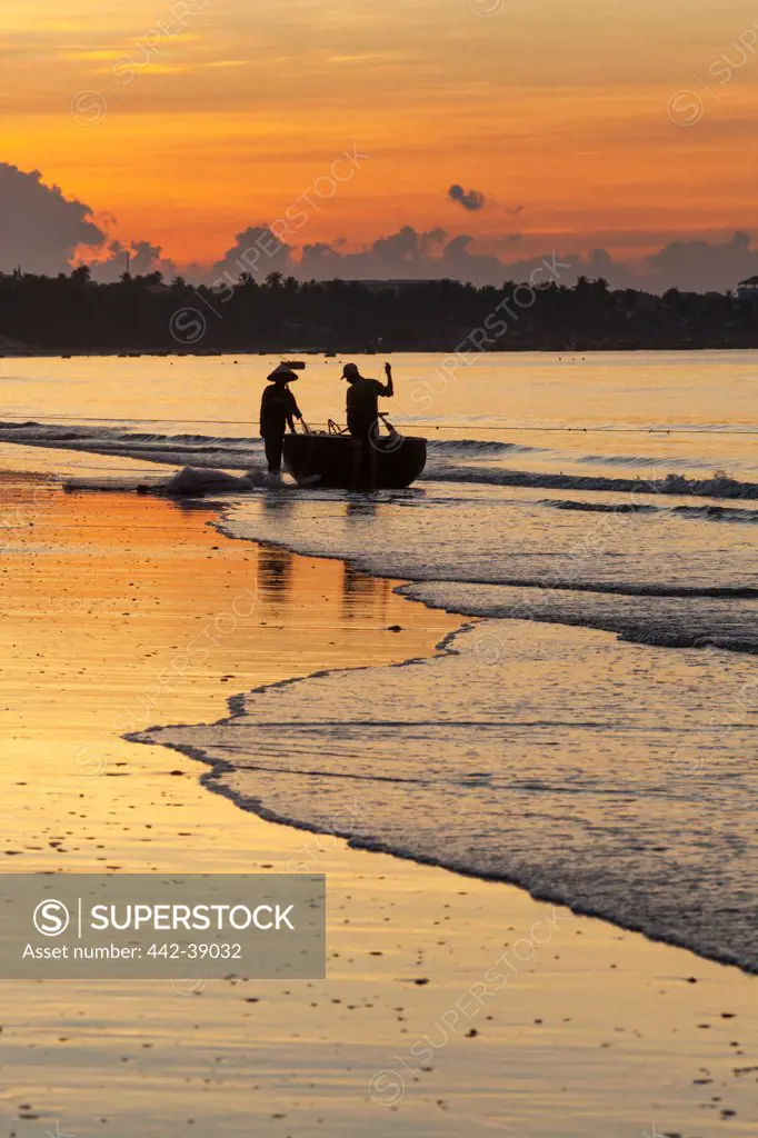 Vietnam, Mui Ne, Mui Ne Beach, Net Fishermen at Dawn