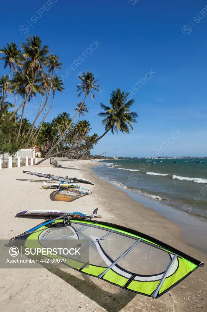 Vietnam, Mui Ne, Mui Ne Beach, Windsurfing Sail and Board on Beach