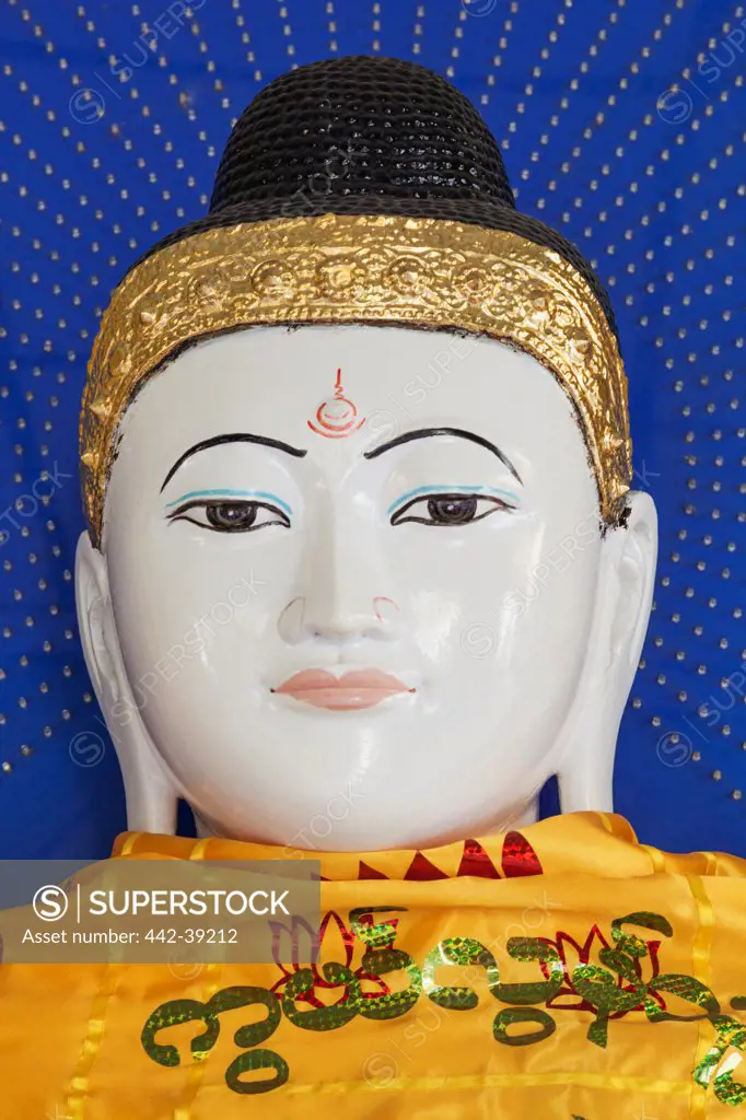 Close-up of a statue of Buddha at a temple, Shwedagon Pagoda, Yangon, Myanmar