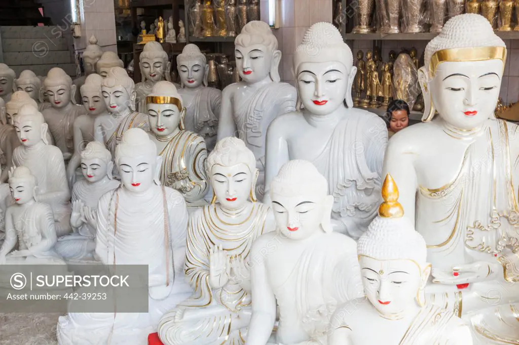 Statues of Buddha on display for sale, Shwedagon Pagoda, Yangon, Myanmar