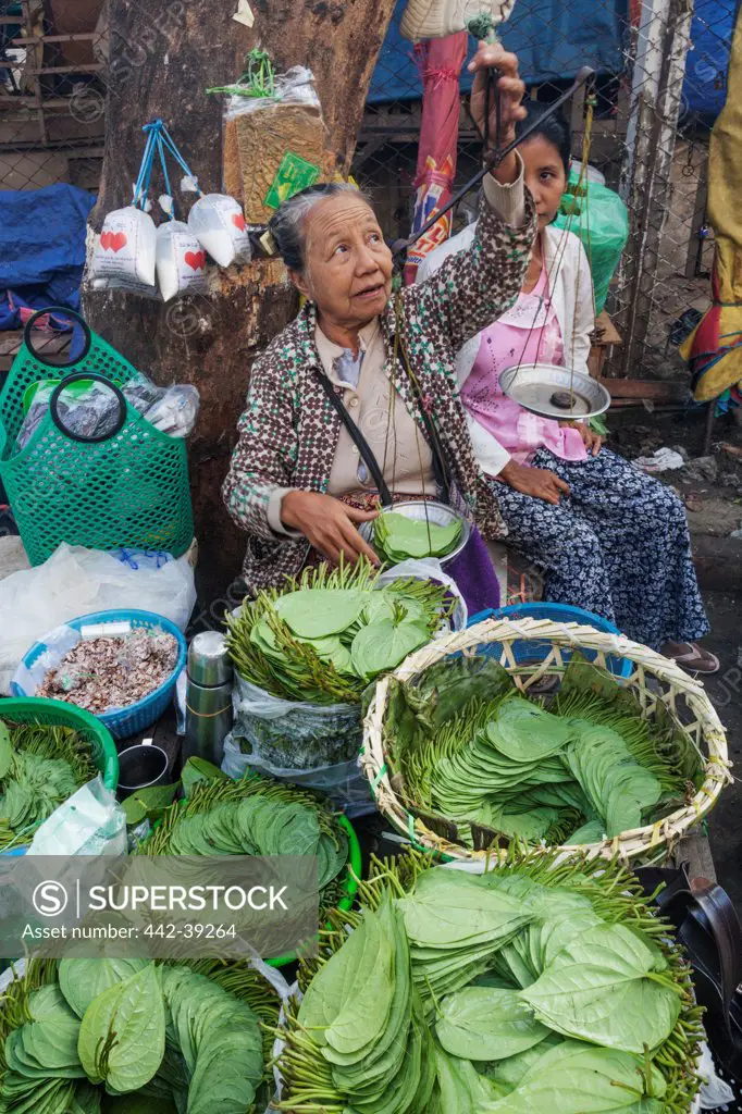 Woman selling betel leaf, Yangon, Myanmar
