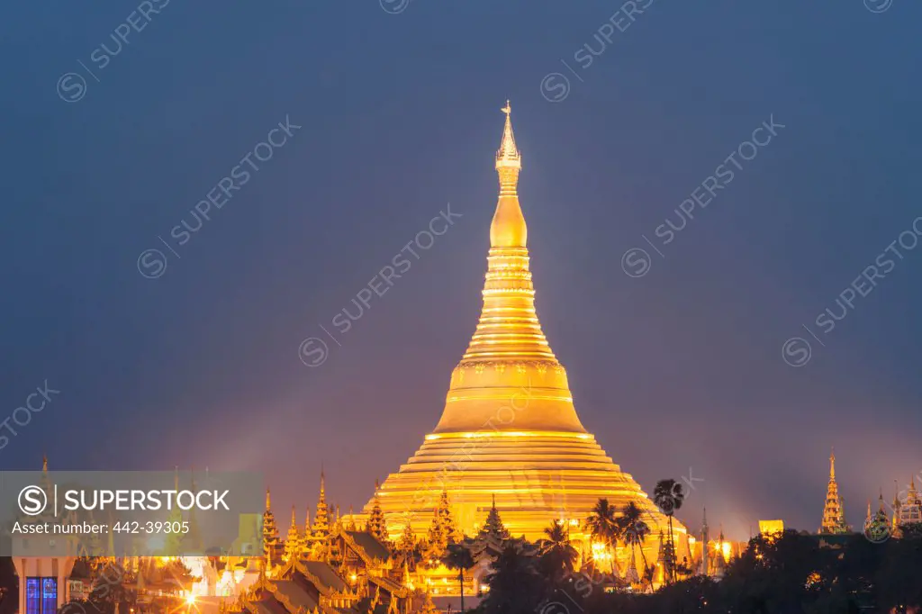 Temple lit up at dusk, Shwedagon Pagoda, Yangon, Myanmar