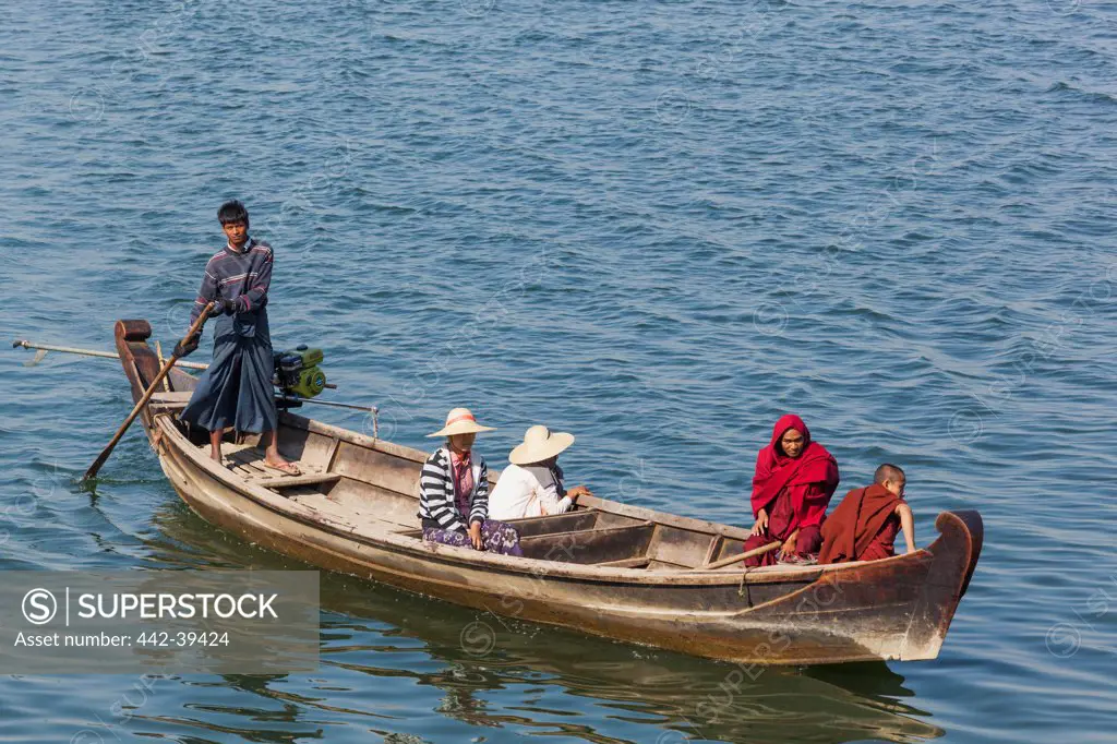 Tourists in a boat crossing the Ayeyarwady River, Bagan, Myanmar