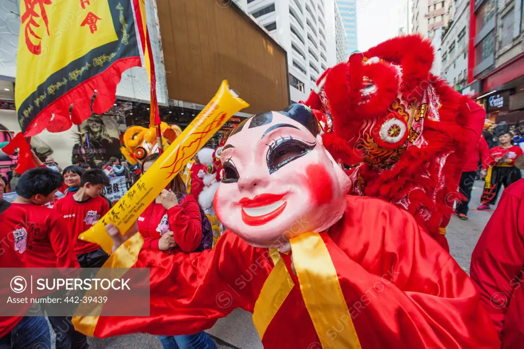 China, Hong Kong, Festival Participant in Lucky God Costume