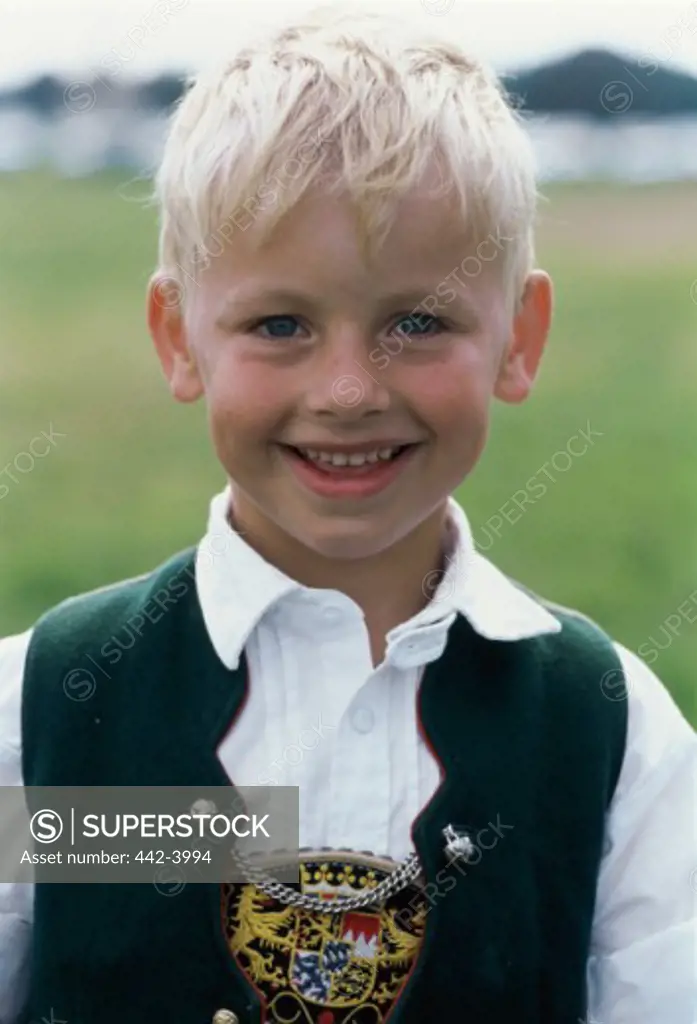 Portrait of a boy smiling in a Bavarian festival, Rosenheim, Germany
