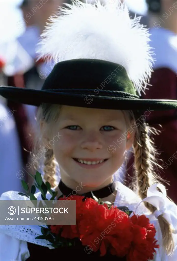 Portrait of a girl smiling in a Bavarian festival, Rosenheim, Germany
