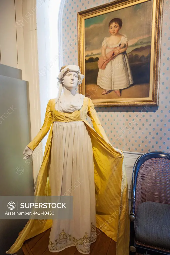Statue and paintings of Lady Emma Hamilton in a museum, National Museum of the Royal Navy, Portsmouth Historic Dockyard, Portsmouth, Hampshire, England