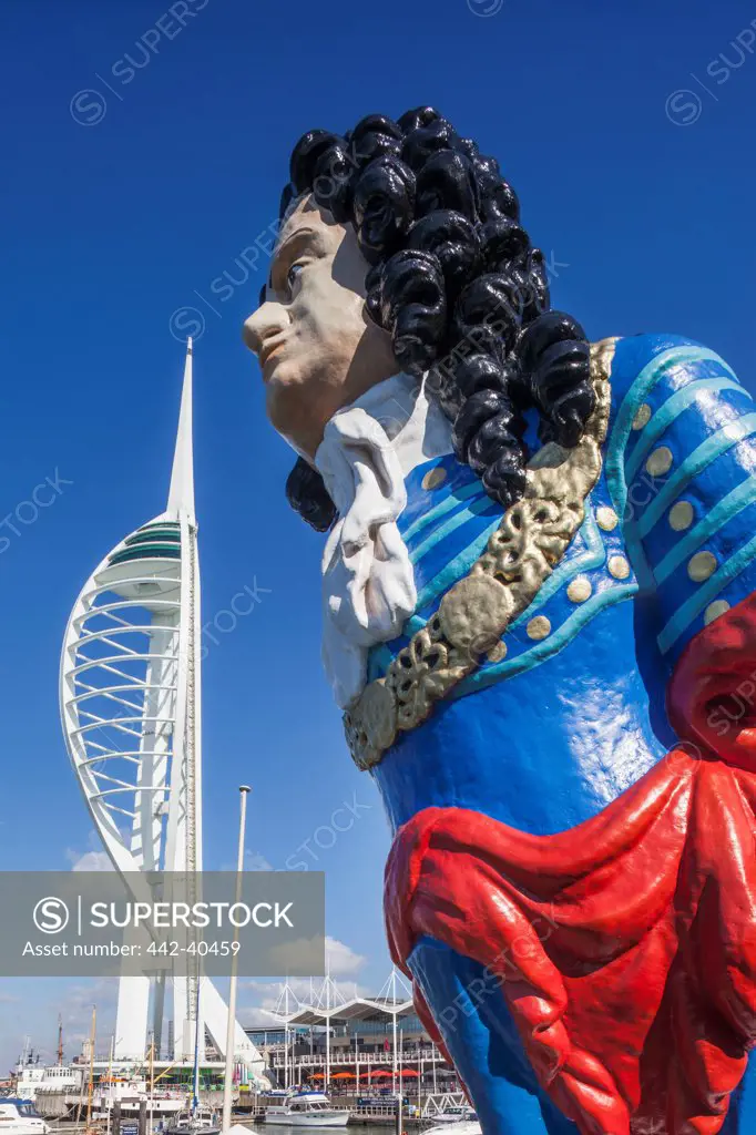 Statue with tower in the background, Spinnaker Tower, Portsmouth, Hampshire, England