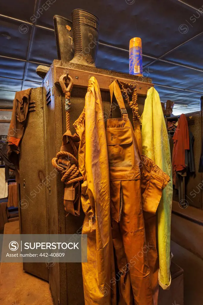 Display of worker lockers and clothing in a museum, Geevor Tin Mine, Pendeen, Cornwall, England