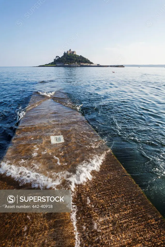 Jetty in the sea with island in the background, St. Michael's Mount, Marazion, Cornwall, England