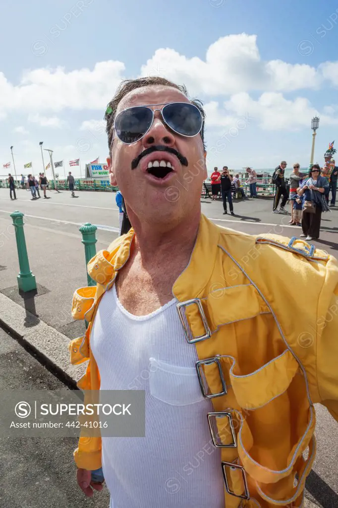 Parade participant dressed as Freddie Mercury in Brighton Gay Pride Parade, Brighton, East Sussex, England