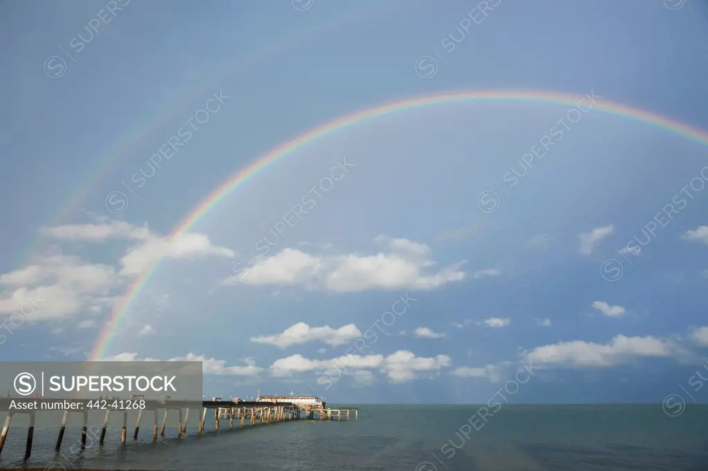 Rainbow over a pier, Deal Pier, Deal, Kent, England