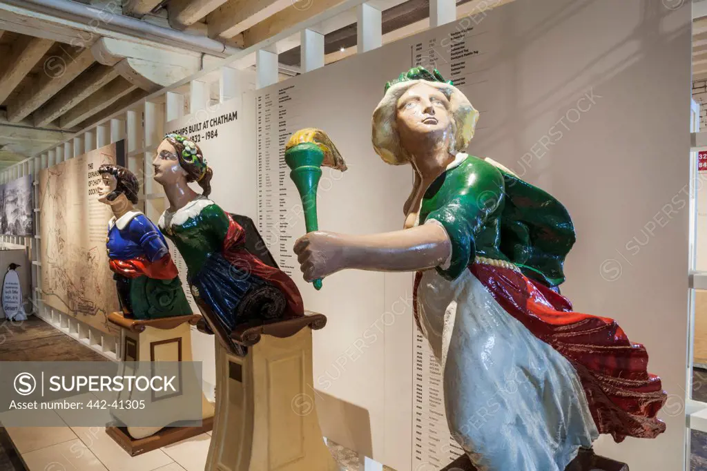 Exhibition of historic ship figurehead at a maritime museum, Chatham Historic Dockyard, Chatham, Kent, England