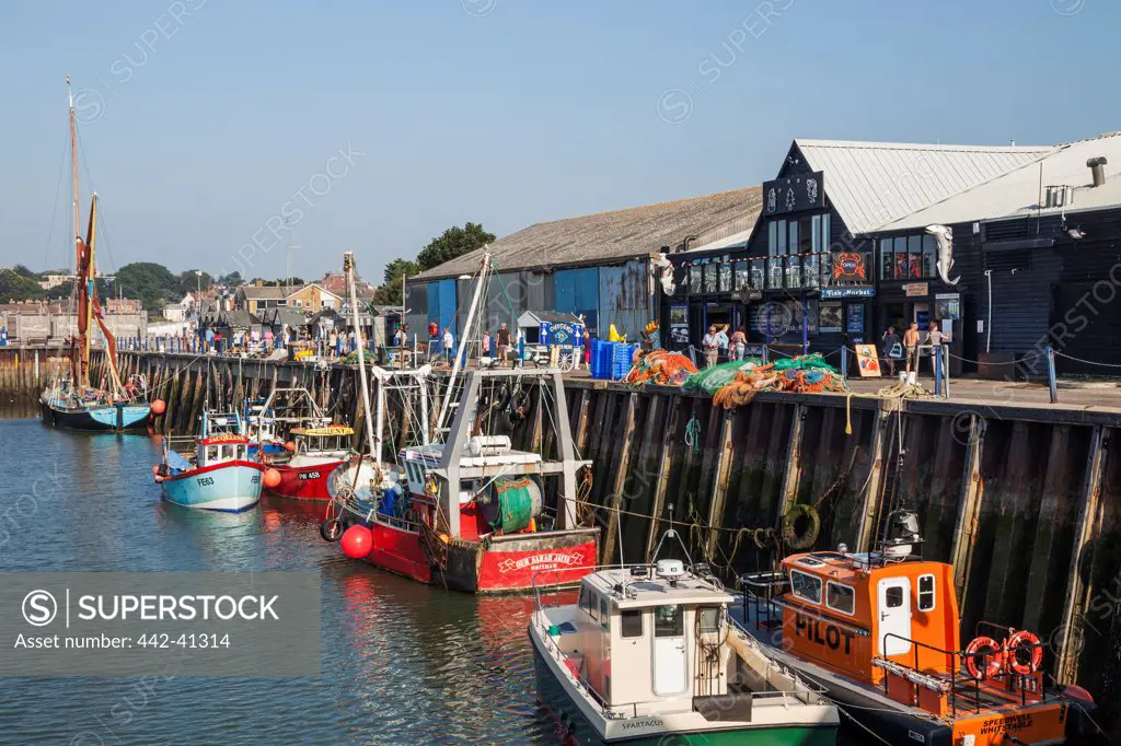 Fishing boats at a harbor, Whitstable Harbor, Whitstable, Kent, England