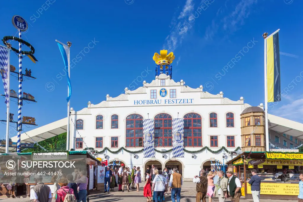 Tourists outside the Hofbrauhaus Beer Tent during Oktoberfest festival, Munich, Bavaria, Germany