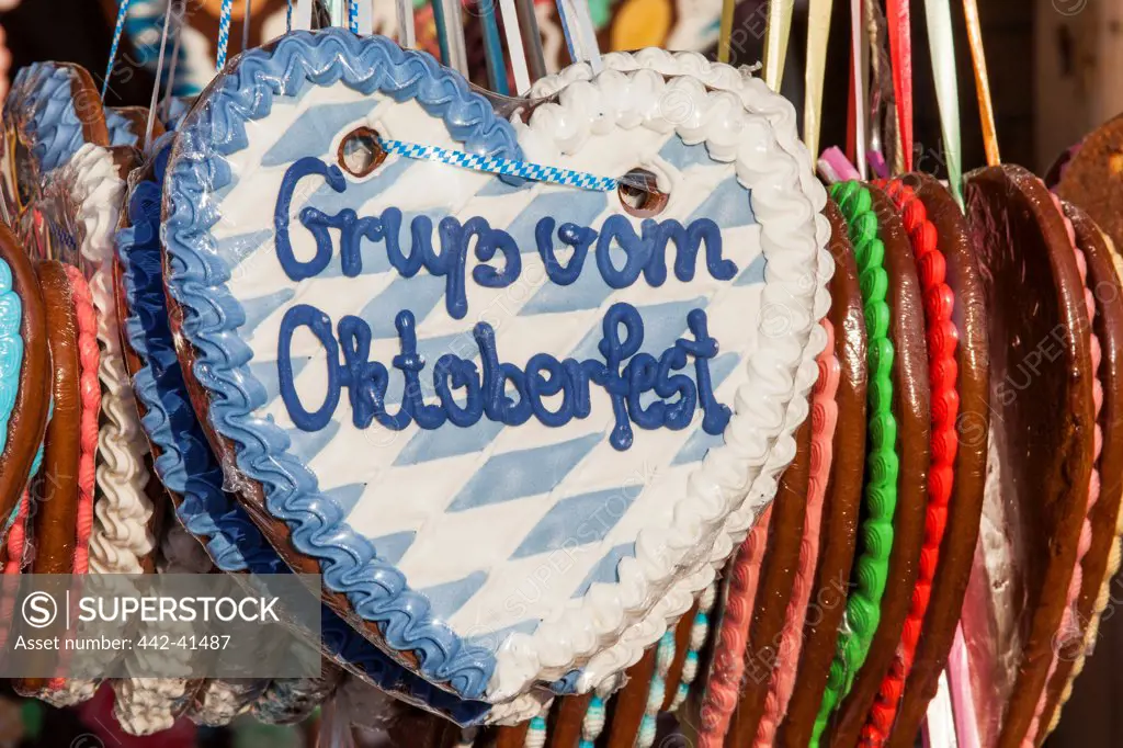 Display of traditional Lebkuchen hearts at market stall during Oktoberfest festival, Munich, Bavaria, Germany