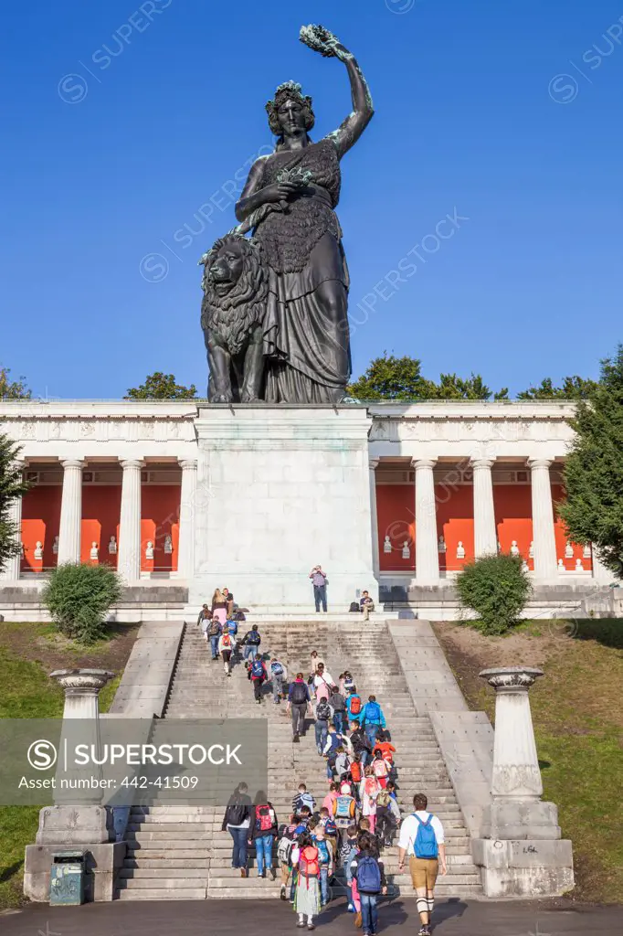 Tourists at a monument, Statue of Bavaria, Munich, Bavaria, Germany