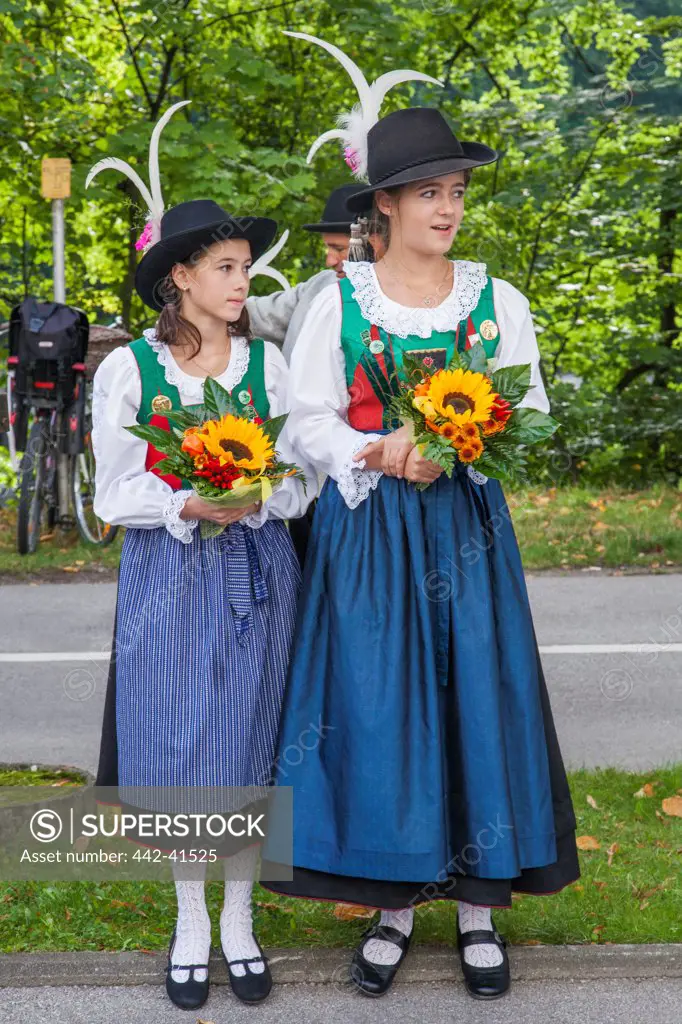 Two girls dressed in regional costume, Oktoberfest, Munich, Bavaria, Germany