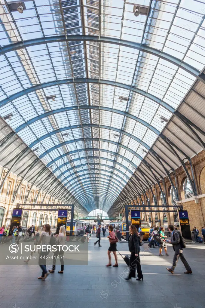 Passengers at platforms, Kings Cross Station, Kings Cross, London, England