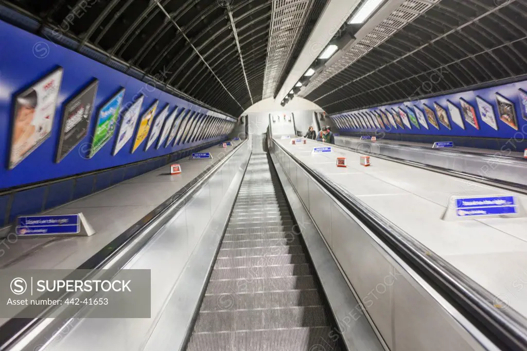 Underground escalator, London, England