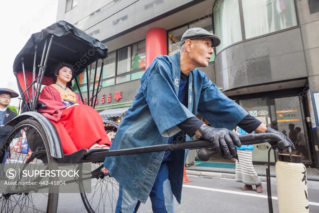 Japan, Honshu, Kanto, Tokyo, Asakusa, Jidai Matsurai Festival, Woman in Rickshaw